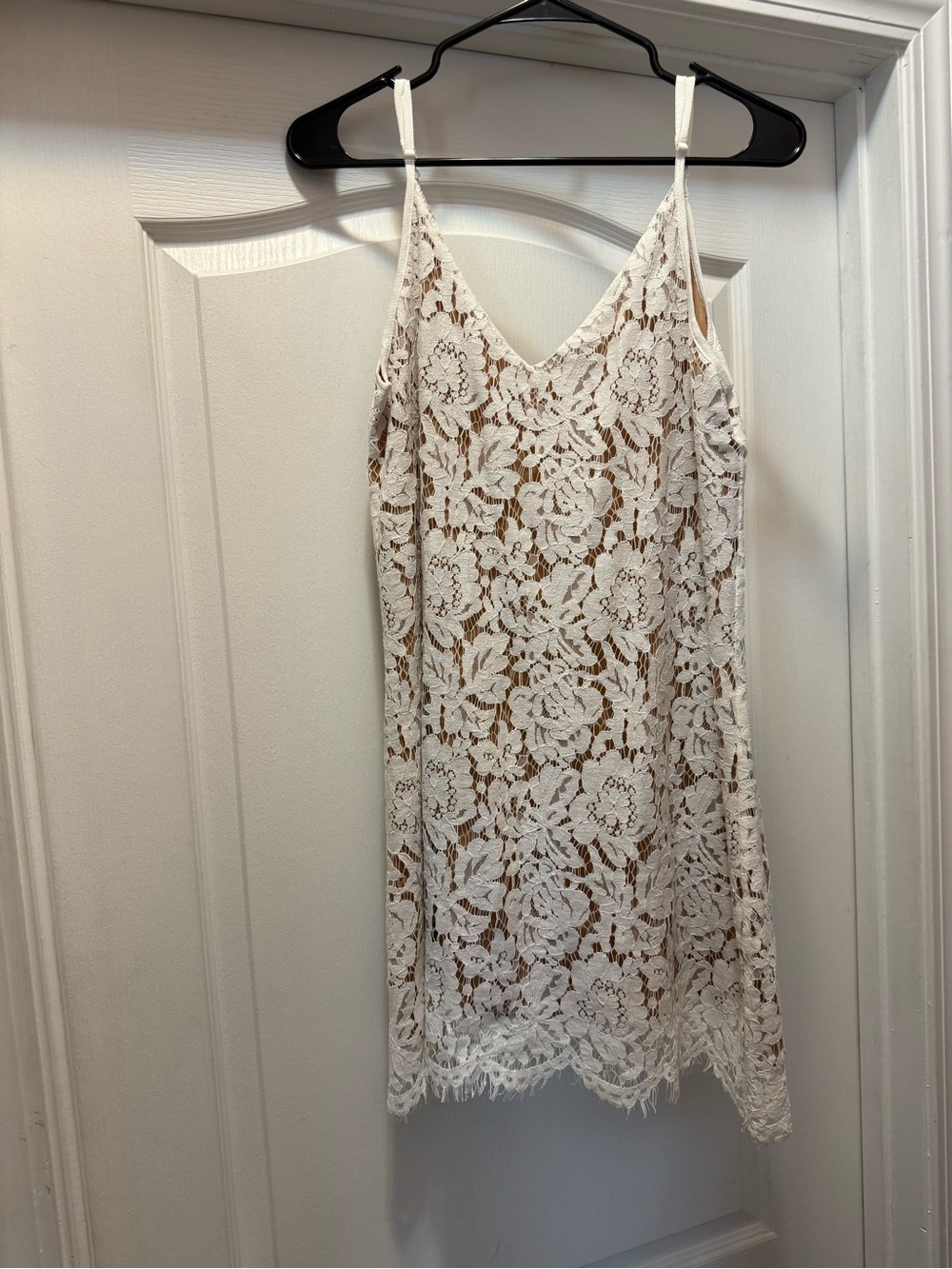 Lacy lined white mini dress
